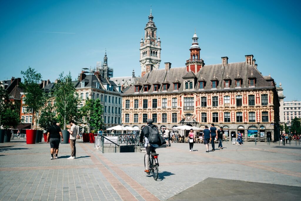 pexels-photo-18596319-18596319 People in Front of the Old Stock Exchange Building in Lille